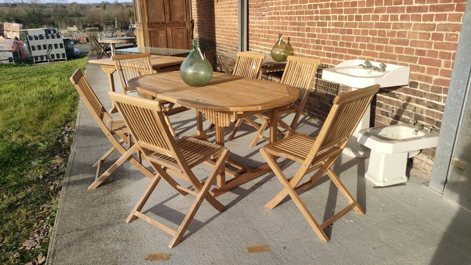 Table de jardin ovale en teck Table de jardin ovale en teck